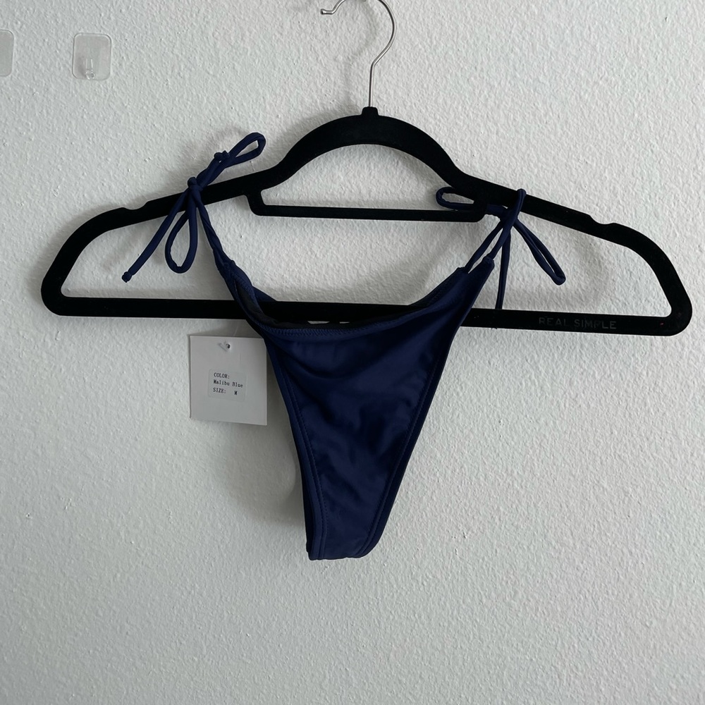 Brand new, never worn. Tags still on. Top sold too